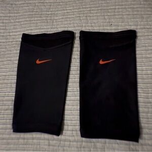 Nike Black knee sleeves with Orange Swoosh